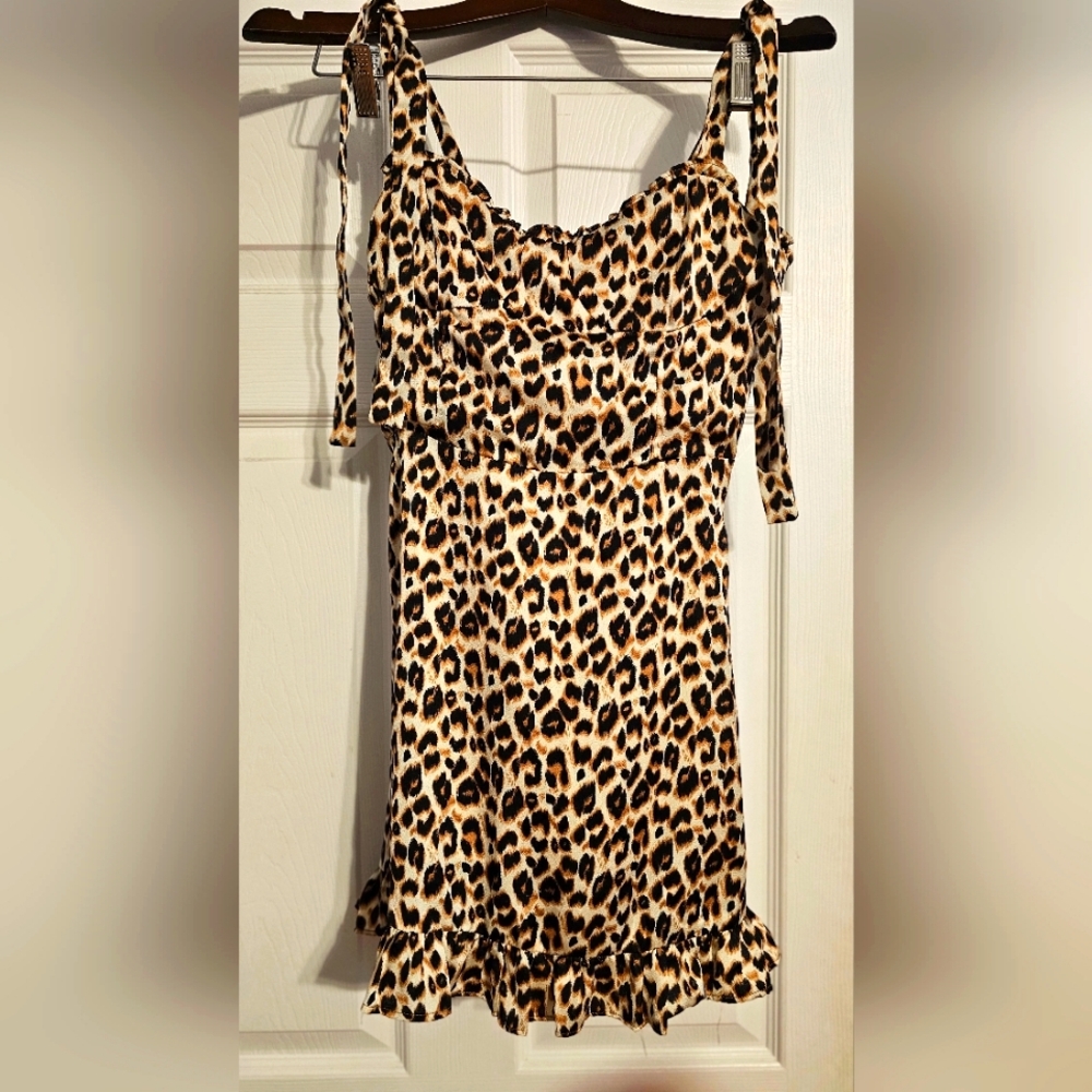 Etiquette Cheetah print midi dress. Size S. Tie straps over the shoulder.